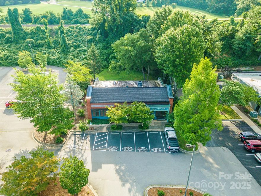**Animal Hospital South** Outstanding investment opportunity backed by national veterinary practice. 1-level veterinary hospital built in 1998 to serve the explosive growth in south Asheville. Unparalleled location, situated on 5-lane Hendersonville Rd (Hwy 25). Exceptional street signage. Potential for expansion or additional parking on excess land. Anchored by a national vet operator to ensure long term stability and income appreciation.
**INVESTMENT HIGHLIGHTS**
* Established 44-year-old veterinary practice with 2 locations for sale (**see also 1275 Tunnel Rd, Asheville, NC - Animal Hospital East**)
* Practice acquired in 2024 by Blue River PetCare, a national veterinary group with over 200 locations in the US
*Over 80% of the City of Asheville population lives within a 5-mile radius
*Dominant pet hospital serving south Asheville
*Triple net (NNN) investment opportunity
*Blue River PetCare’s commitment to Asheville will ensure a stable, long-term investment for the purchaser