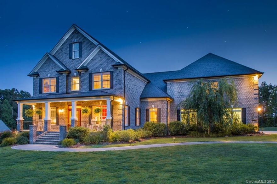 Just 20 minutes from I-485 is an impressive custom Executive home on 1.5 acres with numerous amenities. The kitchen boasts 2 Bosch dishwashers, Jenn Aire gas cook top, double convection wall ovens and built in refrigerator. The owners spared no expense in building this home to include 2 gas log fireplaces, an elevator for ease of access to all floors, network closet to hide equipment, tons of storage and 4-car garage! Too many upgrades to list. Great small town feel, yet central to everything.