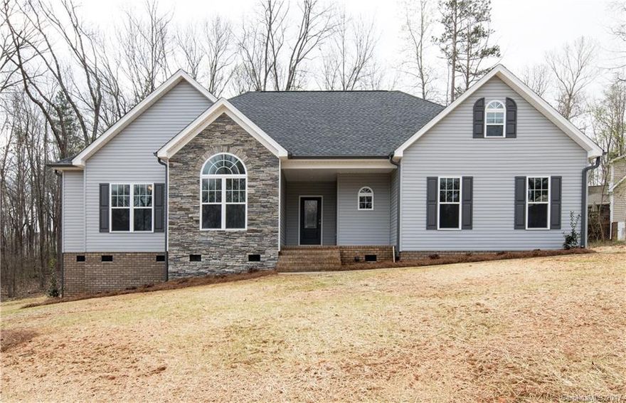 Come check out this beautiful new construction home ready just in time for Spring! Guests are sure to love your spacious floor plan that opens onto the large back deck. The wooded lot is over half an acre and will make you feel as though you were on a retreat in the mountains. The custom kitchen is a cooks dream including a large island and stainless steel appliances. Hurry to schedule your showing before this one is gone!