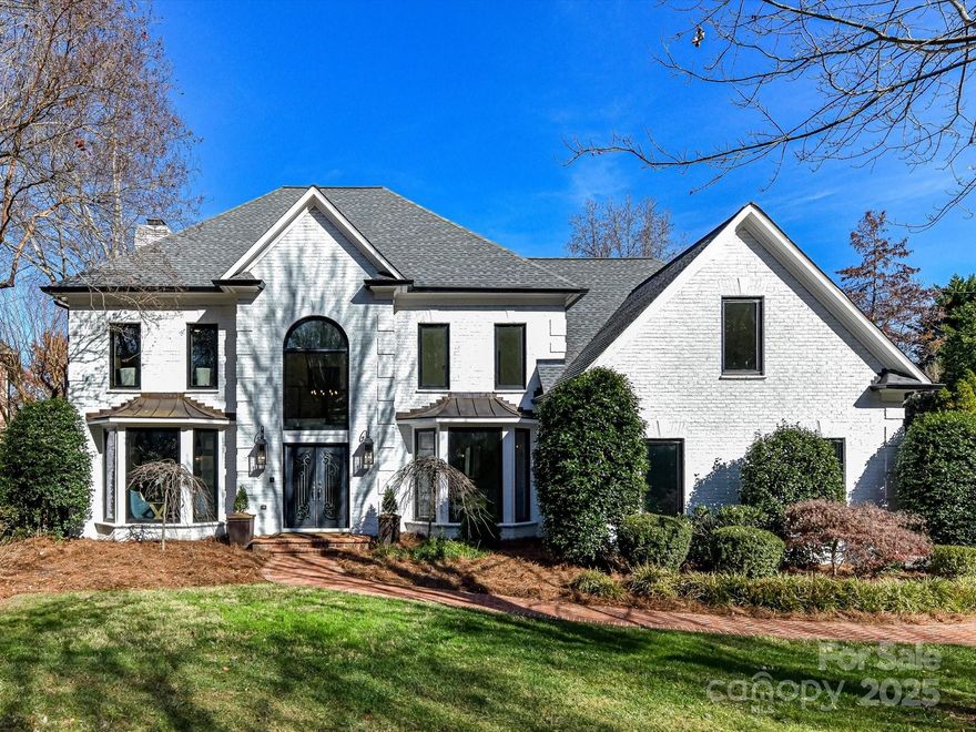 Located in one of south Charlotte's most desirable communities, Ballantyne Country Club, this home is beautifully positioned on a corner lot in a private cul-de-sac. This exceptional brick residence offers an elevated lifestyle where refined finishes meet thoughtful functionality. From its welcoming façade to its meticulously curated interior and outdoor amenities, every detail has been designed for comfort, style, and ease.
Step inside and experience the warmth of white oak flooring gracing both the first and second levels, setting the tone for a sophisticated and cohesive design. The heart of the home features an updated, beautifully appointed kitchen with 2 built-in refrigerators, microwave in the island, gas cooktop with stainless vented hood, 3 wall ovens, warming drawer and a built-in Miele coffee maker! Kitchen is open to spacious living and dining areas ideal for gathering and entertaining. The great room showcases a striking linear fireplace, creating a contemporary focal point and an inviting atmosphere.
Convenience and accessibility are seamlessly integrated with a residential elevator servicing every floor, ensuring effortless movement throughout the home. The primary suite with updated bath, along with 3 additional bedrooms, 2 full baths and bonus area with bar, dishwasher and mini refrigerator complete the upper level.
The lower level enhances both versatility and lifestyle with new LVP flooring, Family room, gym/flex space, bedroom/flex space, bar with wine refrigerator, kitchenette with dedicated laundry space, offering exceptional flexibility for entertaining, extended guests, or multigenerational living.
Fresh paint throughout the home, including 3 car garage, provides a crisp, move-in ready aesthetic.
Step outside and discover a private outdoor sanctuary designed for unforgettable moments. The salt water, infinity edge pool and spa were resurfaced in November 2025 and anchor a stunning entertainment space featuring a full outdoor kitchen, bar seating, and a cabana with fireplace—a true retreat for seasonal enjoyment or year-round celebration. Welcome to your piece of paradise in a fabulous location!