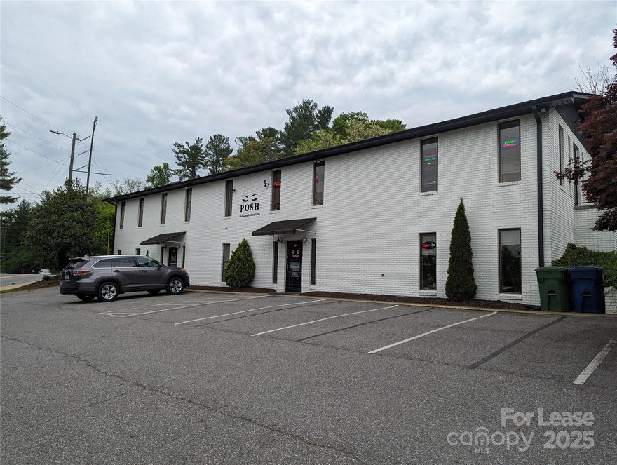 For the first time in over 10 years, this highly desirable corner office in North Asheville is available for lease. The space offers abundant natural light through multiple windows and features enhanced wall soundproofing for privacy and productivity. One convenient monthly payment covers all essentials; lease, electric, water, internet and janitorial services, providing exceptional value and simplicity.

This office is one of five suites that share a welcoming waiting area, a well-appointed bathroom, and a kitchenette equipped with cabinets, refrigerator, sink, and a dedicated break area. The building was fully remodeled in 2015 and refreshed with new exterior paint in 2022, creating a modern, professional environment.

Additional highlights include ample on-site parking for tenants and guests, handicap accessibility, and dedicated signage space for increased visibility. Ideal for professionals seeking a turnkey office solution in a prime location.