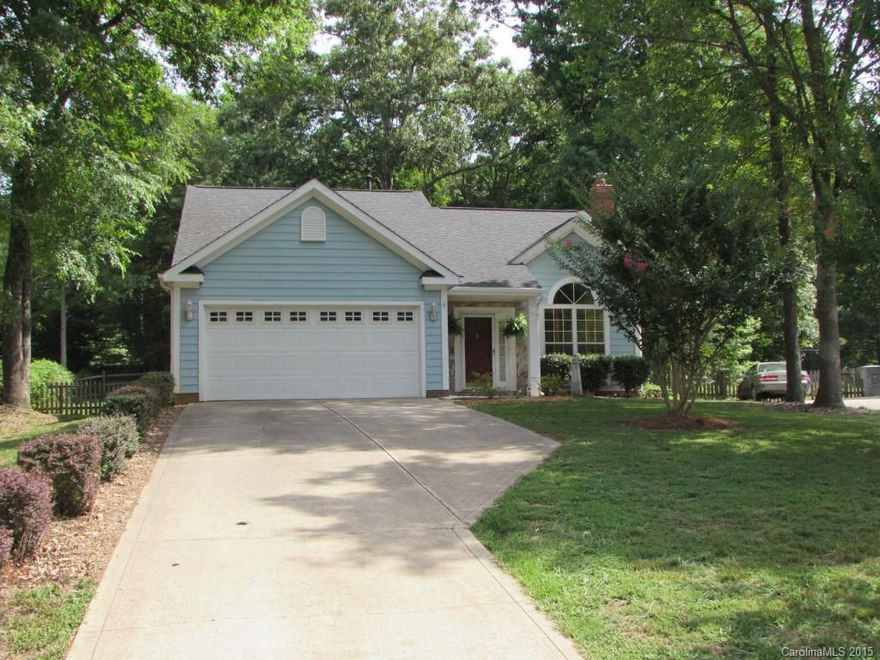 Great open floor plan with wood floors throughout! Master bedroom on main floor w/two spacious bedrooms upstairs. Plantation shutters throughout home.  Great sized closets in every room. Easy  access to I85, I77 and 485. Fenced yard in cul-de-sac. Washer & dryer included.  Play set and storage shed to stay.   Lots of storage throughout and space to live!