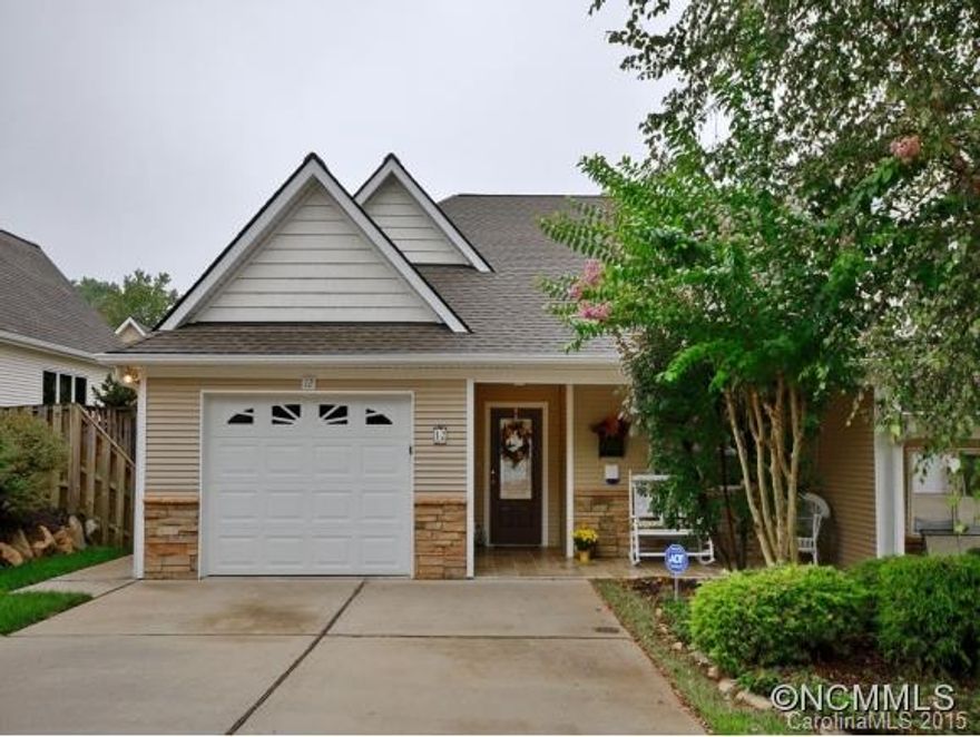 Beautiful garden home. Some hardwood floors on main. Open & bright. Wonderful one level living~ 2 bedrooms 2 baths on main. Stunning ceilings with lots of light and beautiful garden space fenced in the back yard.  This unit is like new with Kitchen granite and stainless appliances. Shows like a model. Move in ready! Must see!