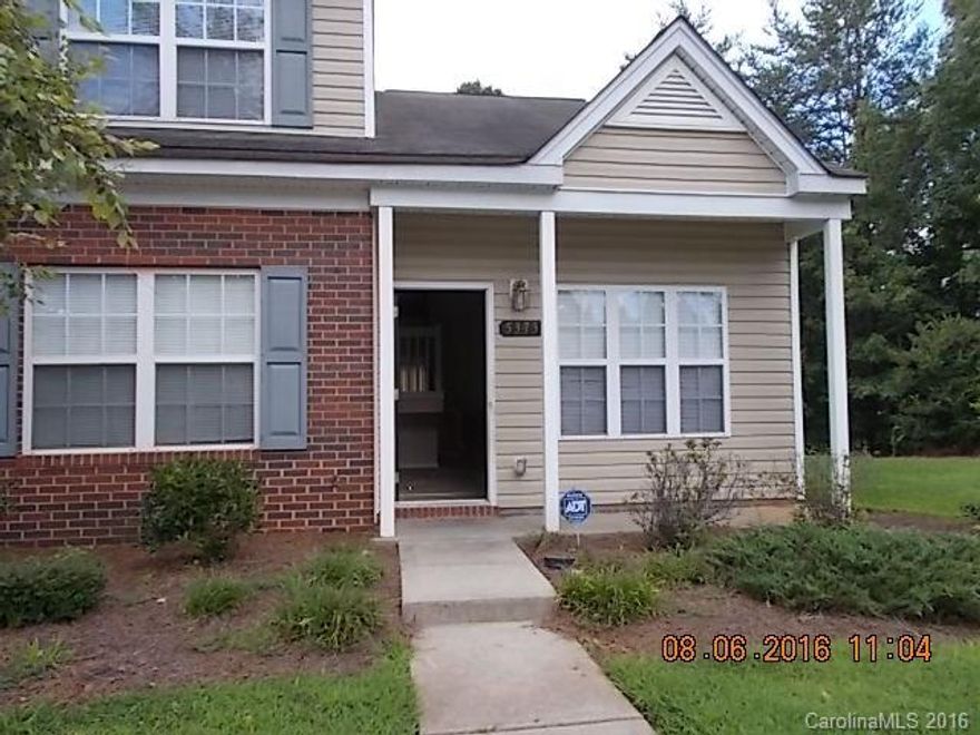 End unit townhome.  Desirable 3 bedroom unit with one bedroom/bath on main level - 2 additional bedrooms and bathroom on the upper level.    Open kitchen/dining area.    Sold as is.