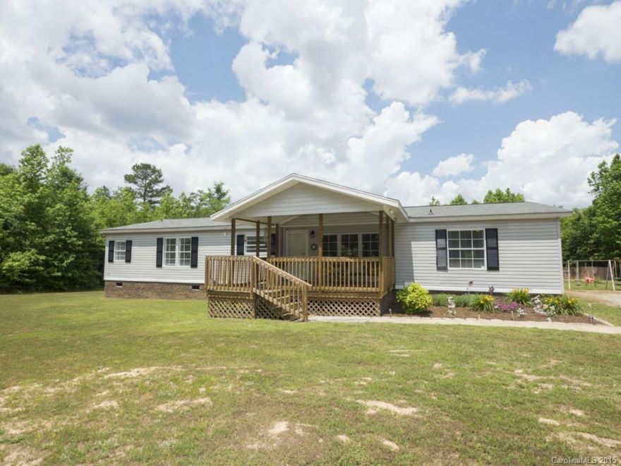 4 Acres, No HOAs, Privacy galore and an amazing 3BR 2BA double wide mobile home with screened back porch, storage buildings, above ground pool with deck and underground shelter!! Come inside to beautiful tile floors in kitchen, laundry and bath, double sinks in master and LOTs of storage.