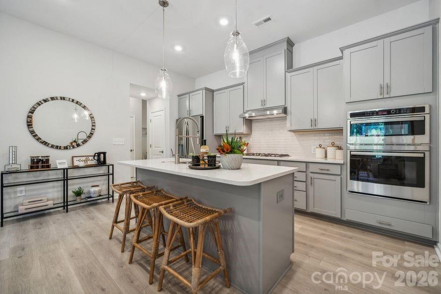 What's Special: Extra Garage Storage | No Rear Neighbors | Loft | 1st Floor Guest Suite | Wooded View. New Construction - July Completion! Built by America's Most Trusted Home Builder. Welcome to the Telluride at 3168 Beacon Heights Road in The Ridge at Sugar Creek! Beginning on the main floor, a vibrant open concept kitchen and casual dining area come together effortlessly, creating a space that feels welcoming and easy to enjoy. An inviting great room sits nearby, along with a private guest bedroom suite featuring a walk-in closet to complete the first floor. Upstairs, a spacious loft at the top of the stairs offers the perfect spot for relaxing or entertaining. The deluxe primary suite provides a peaceful retreat at the end of the day and includes an attached bathroom with a dual sink vanity and a roomy shower. Two additional secondary bedrooms, a shared full bathroom, and a conveniently located laundry room round out the second floor, making this layout both comfortable and functional. Discover Stafford at Langtree in Mooresville, NC, where every day feels like a getaway. Enjoy the pool and cabanas, plus access to I-77, Lake Norman, Downtown Mooresville and Davidson. Swim, boat, fish, jet ski or kayak on Lake Norman or hike the trails in Lake Norman State Park. Mooresville is one of the fastest-growing suburbs in the U.S., and your community is buzzing with excitement and opportunity! Photos are for representative purposes only. MLS#4365521