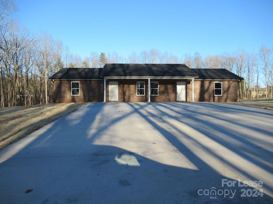 Check out this new brick duplex conveniently located just off Hwy 150 in NE Lincoln County.  The home is in the North Lincoln School District with almost 1000 square feet.  This one offer a large Den, nice kitchen with granite counters and all appliances.  Vinyl Plank Floors, ceiling fans, laundry room. Two good sized bedrooms and 1 bath.  Covered front porch & rear patio.  Located in a quiet neighborhood with large yard.  Application is required to be considered for lease.  Pets allowed are small breed only.