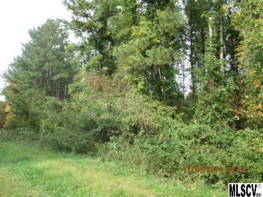 Lot #74 - sloping & wooded with some water frontage. Potential buyer will need to contact lake specialist Wade Harmon with Duke Energy to discuss dockability of lot. See attachment for PAS requirements and WFHM offer submittal information in MLS document section.