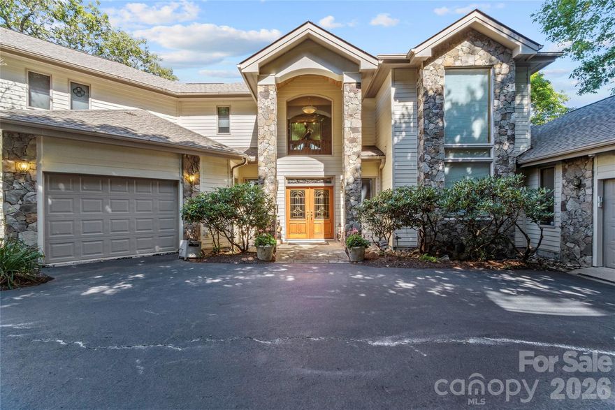 Privately situated at the end of Ball Camp Road in the prestigious MOUNTAIR AIR community, this stunning custom home offers more than 5,000 square feet of luxurious living space—perfect for hosting family and friends while enjoying complete serenity and privacy. The heart of the home is the spacious great room, featuring soaring two-story ceilings, floor-to-ceiling windows that flood the space with natural light, and a striking stone fireplace with custom built-ins. Gorgeous hardwood floors run throughout the home, enhancing its warmth and elegance. On the main level, you’ll find two generously sized guest suites, each with its own private bath, along with a convenient half bath for guests. The upper level is home to the primary suite, a true retreat with vaulted knotty pine ceilings and trim, a gas log fireplace, motorized blinds, and a luxurious en suite bath with a whirlpool tub. Also upstairs are a private office and an exercise room, both offering beautiful mountain views. Each of the home’s three levels features a gas log fireplace operated by remote control, adding comfort and charm. The lower level is designed for entertainment and relaxation, offering a large recreation room with a wet bar/mini kitchen, a playroom or game room, and an additional guest bedroom with full bath. This home is as functional as it is beautiful, with a Navien On-Demand water heater, a whole-house generator, and three separate HVAC systems—one for each floor—for optimal climate control. A two-car garage and a separate cart barn provide ample storage and house two golf carts. One golf cart will be included in the sale. The beautiful grand piano in the main living area is also included. The seller will consider including a full golf membership, valued at $95,000, with an acceptable offer. A full-price offer will automatically include this exclusive full golf membership, providing access to the world-class golf and amenities at Mountain Air.