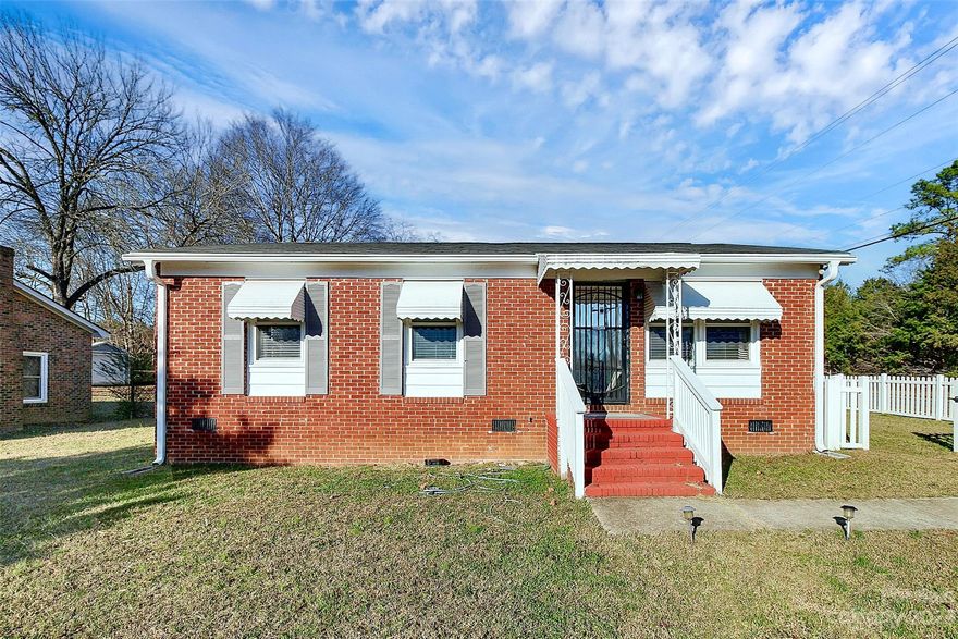 This charming all brick 3-bedroom, 1-bath home serves as an excellent starter home or investment property. Its cozy ambiance is enhanced by inviting hardwood floors throughout. The bathroom has been updated with tile flooring. 
The kitchen boasts updated cabinets and a stylish backsplash, offering a contemporary flair. Step into the backyard, enclosed by a nice white fence, provides a delightful space for outdoor activities, relaxation or entertaining. 
Washer, dryer and storage building is included with the sale of the home.

This property is close to shopping centers, restaurants, schools and also, I-77. Don't miss out on this home, schedule your showing today!