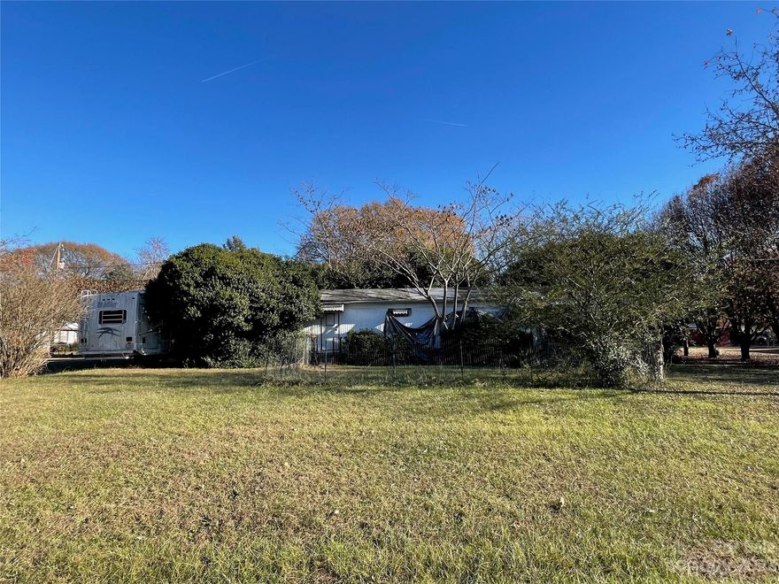 Buildable lot close to I-485.  Large .33 acre lot in established area with many new homes. Great location close to I-485 and I-85. There is currently a single-wide mobile home on the property, but it is sold AS-IS. Value is in the land.