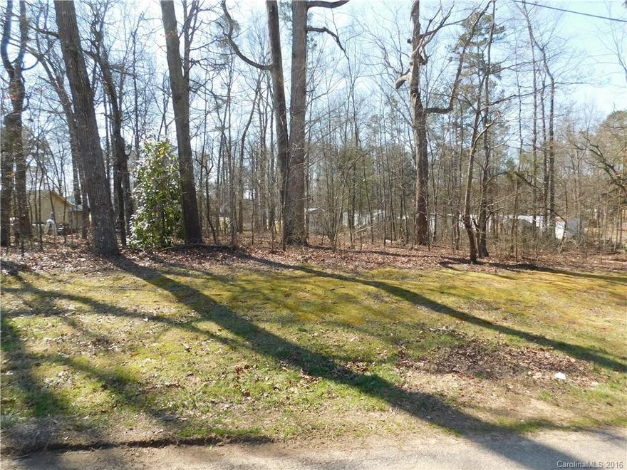 Nice wooded flat lot  Could make 2 homesites per city of Kannapolis,   Great Location close to I-85, NCRC,
schools & shopping