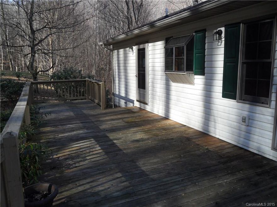 Located conveniently in Apple Creek Acres. Private location with one level living, over 2100 sf, lots of decking, 14 x 24 outbuilding, double car garage. Seller requires Purchaser to obtain Caliber Home Loans Pre-Qual Letter prior to accepting an offer for any non-cash transactions. Purchaser may use any lender to obtain financing for the purchase. SOLD AS-IS: Sellers/Agents make no representations. BUYERS/AGENTS advised to verify all information & perform all inspections. EMD TO BUYERS ATTY.