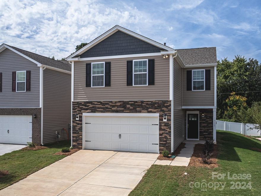 This spacious & modern two-story home is designed with open-concept living in mind. This home features four bedrooms, two & a half bathrooms & a two-car garage, making it perfect for your new home. Upon entering the home, you'll be greeted by an inviting foyer that leads directly into the heart of the home: the great room. This impressive space features a living room, dining area, and well-appointed kitchen. The kitchen is equipped with a pantry, stainless steel appliances, & a large island with a breakfast bar, making it perfect for both cooking and casual dining. The home also features a primary suite, complete with a large walk-in closet and ensuite bathroom featuring dual vanities and a spacious shower. The additional three bedrooms share a full bath that includes dual vanities. Outback is a patio, perfect for outdoor entertaining. With its thoughtful design, spacious layout, and modern conveniences.