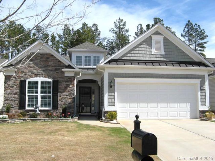 Beautifully appointed "Model like/ Move in Ready" home w/ Exotic Wide Plank HW's throughout, Neutral Paint & Trim, Shutters, Custom Lights/Ceiling Fan, Lovely Framed Mirrors, Surround Sound, Master Tray Ceiling, Tile Wet Areas, Laundry Sink/Cabinets, SS Built-in Appl, Gas Cooktop, Granite, Tile Bkspl and more! This Open plan offers 3 Bedrooms plus Office, Sunroom, Screened Porch, Oversized Paver Patio located on a Private Lot. Convenient to the new amenity  and the canoe and kayak center.