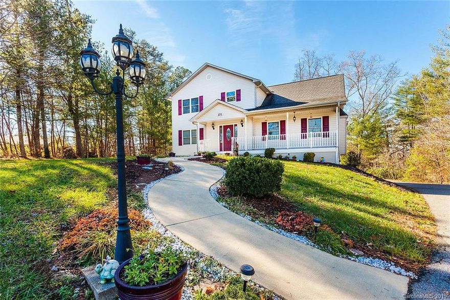 Meticulously maintained and spacious one-owner home, convenient to Asheville & Weaverville. Great room w/soaring ceiling & vented gas fireplace. Open floor plan. Kitchen w/breakfast bar, large pantry & gas stove. Spacious master suite on main. All bedrooms have large walk-in closets. Basement offers 970 sq ft of additional living space w/family room, two bonus rooms and bath. Potential for home office or in-law suite. Nice workshop area in garage. Large deck to enjoy the beautiful surroundings.