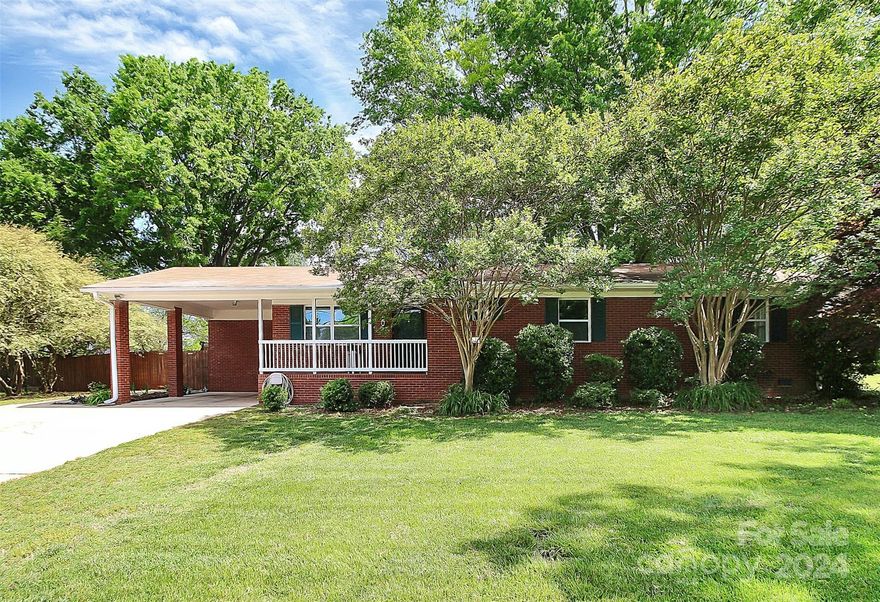 Welcome to this charming 3 bedroom brick ranch nestled on a spacious lot with a 6ft fenced yard, perfect for privacy and outdoor enjoyment. Located in a quiet neighborhood with NO HOA! Admire the massive shade trees and maintained flower beds that add a touch of beauty to the landscape. This home boast a detached garage workshop, ideal for hobbies and storage. Conveniently located with easy access to highway 74, Downtown Monroe and the bypass, this property offers both tranquility and accessibility. With its curb appeal, this is not an opportunity you want to miss! New hot water heater 2023, New Anderson double hung windows 2024, New main water line 2023, City trash pickup.