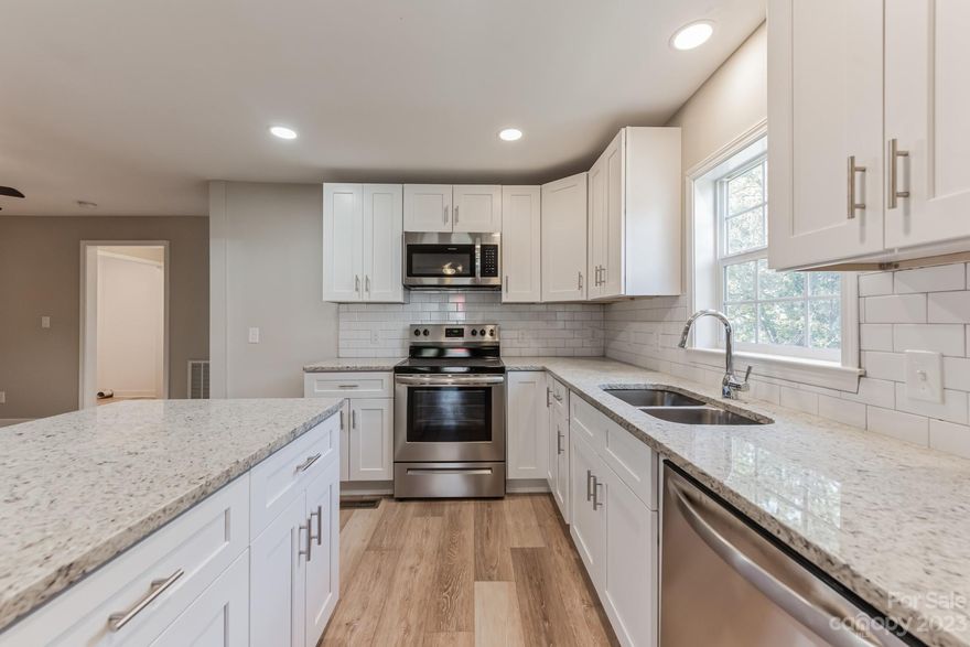 Discover this fully renovated 3-bedroom, 1-bath home featuring new siding, gutters, and a completely redone interior. This kitchen is equiped with stainless steel appliances and a modern kitchen. The bathroom showcases new fixtures and tiling. Outdoors, a spacious yard awaits your personal touch. Located in a welcoming community, this move-in-ready home is perfect for making new memories.