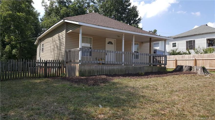 Located on a quiet street in town. Well maintained home has been upgraded and remodeled with open concept and high ceilings. Great covered front porch  and a back deck for relaxing or entertaining. Kitchen and bathrooms have been updated. New 30 yr roof in the front of the house installed Nov. 2015. 20 year roof in the back of home did not need replacing. Hvac system was installed in 2008. Dishwasher, refrigerator, oven/range, microwave/hood to stay with the home. Fenced in backyard.