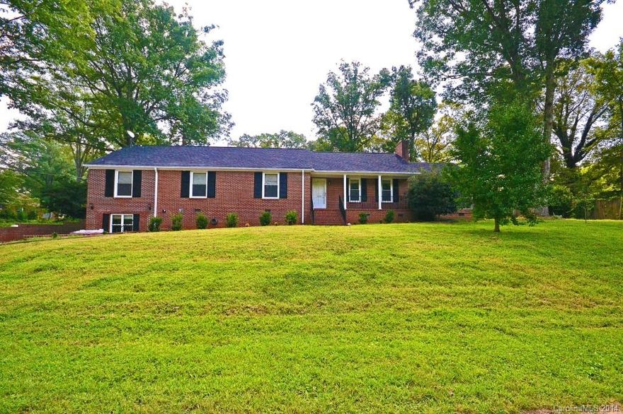Not your typical Fort Mill rancher. This 3 bedroom 2 full bathroom home features a large kitchen with gas stove, maple cabinets and center island cook area. The master bedroom has a large walk-in closet and beautiful  master bath. Spacious screened cedar deck that looks out over the large fenced backyard. Buyer can easily convert the basement room back to a one car garage.  A great value and within walking distance to downtown Fort Mill. Your chance, make this house your home.