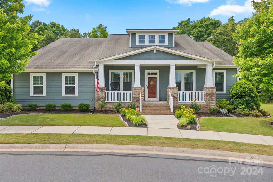 NEW PRICE $50,000 off original list!! Stately craftsman style ranch with 650sqft bonus room up that could also be 5th bdrm. Open concept kitchen and great room, perfect for entertaining. HUGE kitchen island with seating for 6 as well as a large casual dining area. Flex space off kitchen can be additional office or play area. Spacious primary suite with extra deep soaking tub and oversized walk-in shower! 2 additional bdrms and bath on one side of home and a guest suite and full bath on the other. You'll love the HUGE bonus room with 2 built-in loft style beds, half bath, and WI closet. REAL hardwoods through out living areas/kitchen. Relax on the covered front OR back porch. Almost half-acre lot on quiet side street w only 3 homes and across from park/common area, make this location extra special! Fenced yard backing up to trees. Extra long and wide driveway offers plenty of room for parking and play. New HVAC in 2021. All the amenities of Massey and great Fort Mill schools!