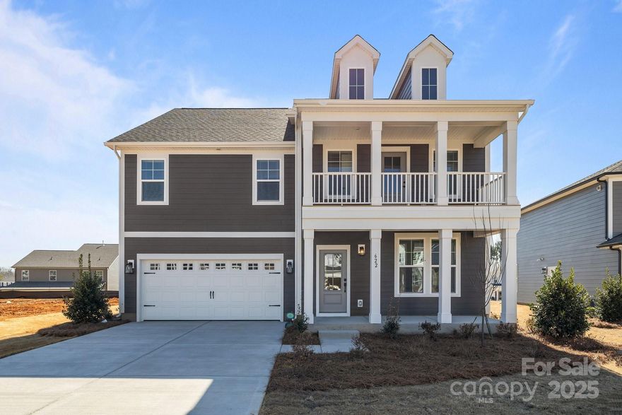 Welcome to Lakeside Glen & the Jordan plan! Spanning 3,240 sq ft, this home features 4 bdrms, 3.5 baths, and is brimming with upgrades. The open-concept layout includes a double front porch, LVP flooring on the main level, a gourmet kitchen w/ stainless steel appliances (double wall oven), pot filler, farmhouse sink, quartz c-tops, & a spacious island perfect for entertaining. The main floor is also home to a formal dining rm, a large family rm, & a home office. Take the oak-treaded stairs to discover a luxurious primary suite w/ tray ceiling, dual-sink vanity, tiled shower w/ rain showerhead, Integrated Diverter Spa w/ Body Sprays, & a spacious walk-in closet. Secondary bdrms are well-sized with walk-in closets & share access to a loft. A hall bath, a second-floor laundry room, & ample storage add convenience. Enjoy the outdoors from the inviting double front porch or the expansive covered rear porch. This home is a perfect blend of comfort and sophistication! Est Completion 2/25