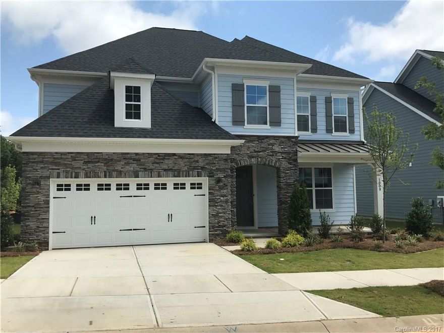 Stunning open design home just like our Sydney Model Home.Hardwoods throughout 1st floor. Guest suite on main, over sized kitchen island,screened covered porch and a large size wood deck. Wood stairs that lead you to the second floor with generous owners suite with a sitting area,4 bedrooms, loft and a large bonus room. Please note that "days on market" includes the initial start of construction of this home and the build time from start to finish.