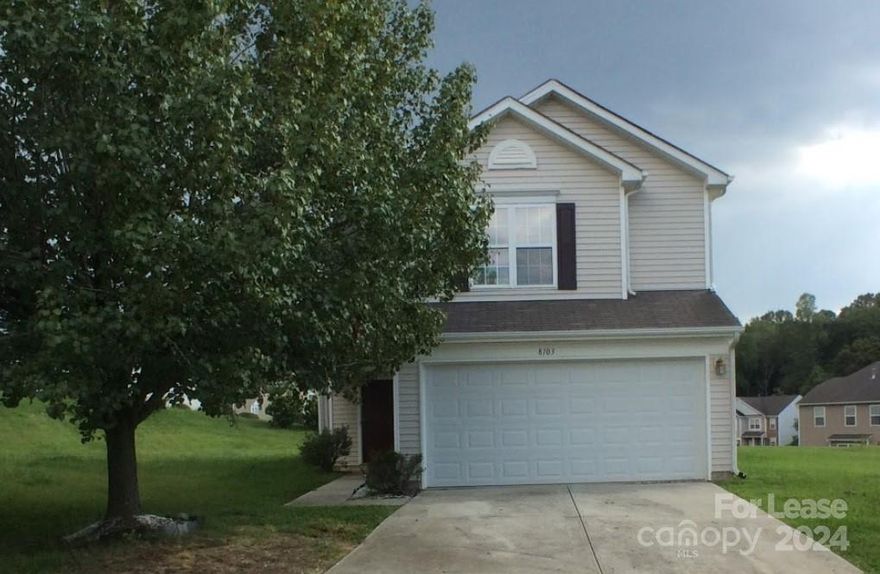 Tucked away on a cul-de-sac lot, this charming 3 bedroom, 2.5 bath, 1,600 sq. ft. home in the Avery Glen community of Charlotte, NC is just waiting for you!  The entrance welcomes you with laminate wood flooring and a cathedral style ceiling. The foyer opens into a cozy family room accented with a fireplace and TV niche above. The eat-in kitchen overlooks the family room and features stainless steel appliances, wood-stained cabinets and plenty of counter space. The laundry room is just off the kitchen. Upstairs, the primary bedroom boasts vaulted ceilings, a walk-in closet and an en suite bath. An open loft, two additional bedrooms and a full bath complete the interior. Relax and entertain in the sunroom or enjoy the open patio!  Just  minutes from Northlake Mall, dining & entertainment. Enjoy recreation at Sunset Hills Public Golf Course & Latta Plantation Nature Center, both only a short drive away. Conveniently close to I-77 and I-485 for commuting in and out of Charlotte.