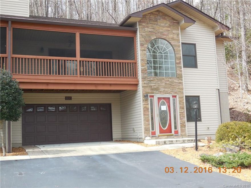 Beautiful town home with all of the Connestee amenities! Wood floors, ceramic tile, stone fireplace with gas logs, open floor plan, lower level rec room with wet bar, screened porch, guest bedroom and bathroom in lower level, beautiful kitchen!  $1500 condo cash incentive for Qualla Village dues.