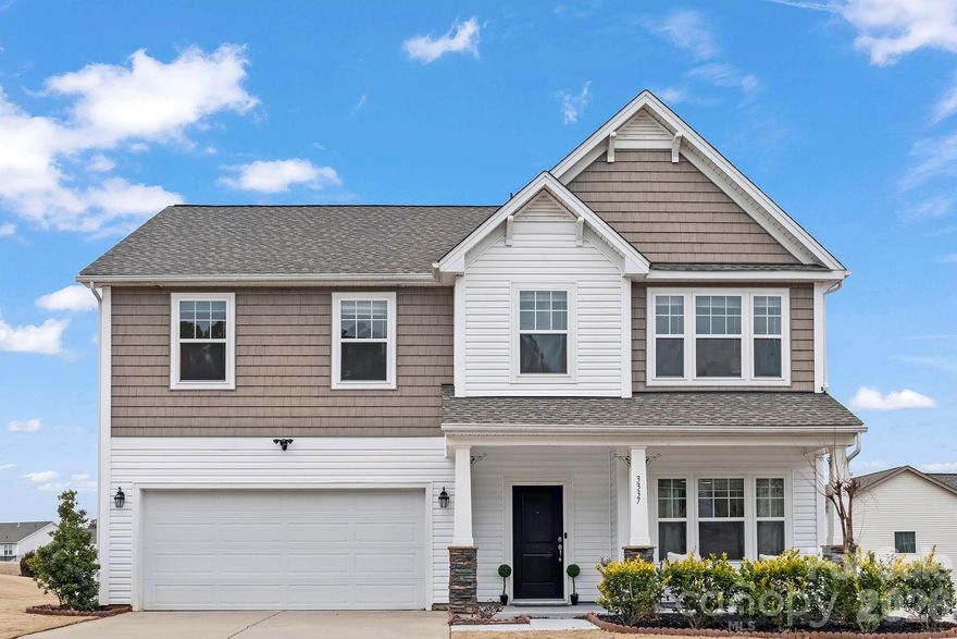 Welcome to this beautifully updated, northeast-facing home offering approximately 3,200 square feet of living space in a gated, vibrant community in highly desirable Fort Mill, SC. Designed for flexibility, comfort, and modern living, this spacious residence features a rare first-floor bedroom with a full bathroom, ideal for guests, multigenerational living, or a private home office.

The main level is bright and welcoming, featuring a functional, open layout that flows seamlessly for everyday living and entertaining. Fresh paint throughout enhances the home’s clean, move-in-ready appeal. Brand-new carpet on the second floor adds comfort and a fresh finish to the upper-level living spaces.

Upstairs, the home truly shines with a fantastic primary suite that serves as a private retreat. The oversized bedroom is complemented by a huge walk-in closet and a well-appointed primary bathroom, offering both comfort and convenience. Additional upper-level bedrooms are generously sized and connected by ensuite Jack-and-Jill bathrooms, ensuring privacy and functionality for family members or guests alike.

A spacious bonus room provides exceptional versatility and can be used as a media room, game room, home gym, playroom, or secondary living area - adding even more value beyond the already impressive 5-bedroom, 4-bath layout.

Thoughtful upgrades include complete underground irrigation, supporting easy lawn maintenance and curb appeal, along with a Tesla EV charger, catering to today’s electric-vehicle lifestyle and adding long-term value.

The community is known for its welcoming, active atmosphere, paired with the peace of mind that comes from gated access.

Enjoy a prime location just minutes from Carolina Place Mall and Bowl at Ballantyne, with convenient access to shopping, dining, and entertainment. Zoned for top-rated Fort Mill schools, education options continue to expand nearby, including the new Harrisburg Global Academy, a charter school scheduled to open in Fall 2026, just minutes from the home. This home truly delivers exceptional value for buyers seeking space, flexibility, and location. 

Move-in ready, thoughtfully updated, and ideally located, this home offers a rare opportunity to enjoy comfort, convenience, and community in one of Fort Mill’s most desirable areas. Schedule your private tour today.