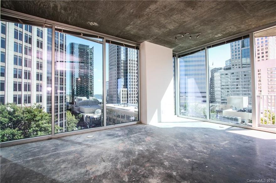 Prime corner unit with city and pool views! Choose your own flooring of your liking. Condo features granite counter tops, tiled bath, floor to ceiling windows, split bedrooms, 2 parking spaces, back splash. Condo comes with LEASING STATUS! Building amenities include 24 hour concierge, grand lobby with water wall, elevated swimming pool, state of the art fitness center, club room, billiards, movie theater room and more! Sellers are offering $5,000 in buyer allowance/upgrades.