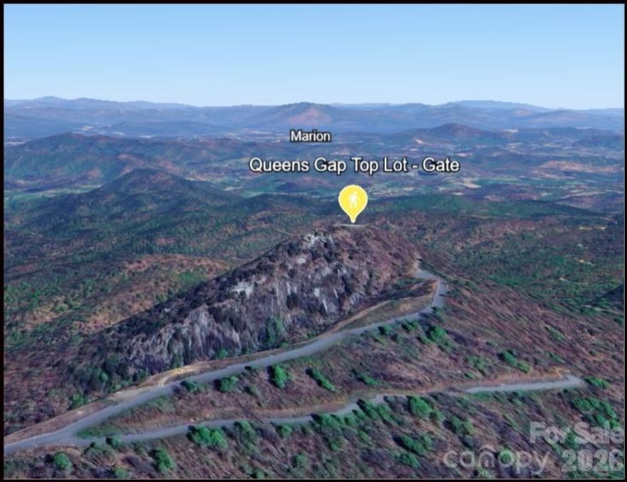 Welcome to “The Queen’s Crown” — an extraordinary 5+ acre homesite perched at the very top of the gated Great Sky community in Union Mills, NC. Tucked away at the end of a quiet cul-de-sac, this premier lot offers unmatched privacy, exclusivity, and some of the most breathtaking panoramic mountain views in the entire community.
True to its name, The Queen’s Crown sits above it all, providing a commanding vantage point with long-range vistas, rolling ridgelines, and unforgettable sunsets. The elevated terrain creates an ideal setting for a custom mountain home, retreat, or legacy property, where nature, serenity, and inspiration converge.
Great Sky features paved roads, public water, and underground utilities, blending modern convenience with the peace of a secluded mountain setting. With light building restrictions and low HOA dues, this community is perfectly suited for full-time living or a private escape.
Ideally located just a short drive to Lake Lure, Lake James, Chimney Rock, and the Blue Ridge Parkway, and within easy reach of Asheville, this remarkable lot offers the best of western North Carolina living. Opportunities to own a parcel of this size, elevation, and distinction are rare — The Queen’s Crown truly reigns supreme.
Call or Text Today to get more Details!