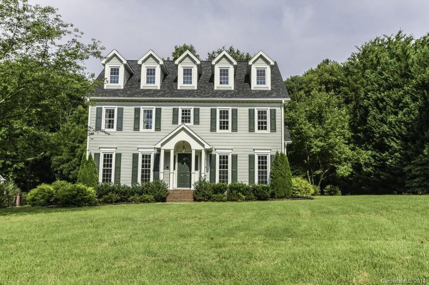 Beautiful three level home in established neighborhood!  Updated kitchen with granite counter tops and tile flooring.  Huge bonus room above 3 car garage could be sixth bedroom.  Third level perfect for in-law suite.  New paint and carpet throughout.  Plenty of storage and additional attic.  New updates include HVAC, tankless water heater, windows, Hardiplank siding, new roof in 2011.  Lovely large lot professionally landscaped.  Convenient to I-485 and close to Charlotte City Center.