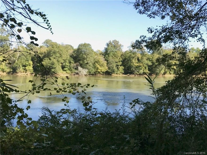 Peaceful living at its finest! This lot boasts over 1-1/2 acres of hardwoods leading to private access to the river. There, you can launch your canoe/kayak or take a stroll along the waters edge. This community is nestled along the Catawba River & offers plenty of outdoor activities including Nature Trails, ballfield, Wooded Common space and Community Pool. This is the perfect location to build your Dream Home, away from the hustle & bustle of city living, but convenient to it when you need it!