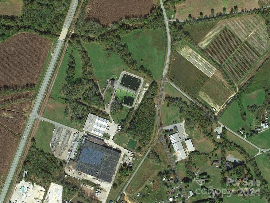 Manufacturing and warehouse site is the former Owen Manufacturing and Cranston Print Works Facility. Also known as NC Hwy 25, this section of Hendersonville Road in the Asheville metropolitan area is 1.6 miles north of I-26, and 1/2 mile south of the town of Fletcher.