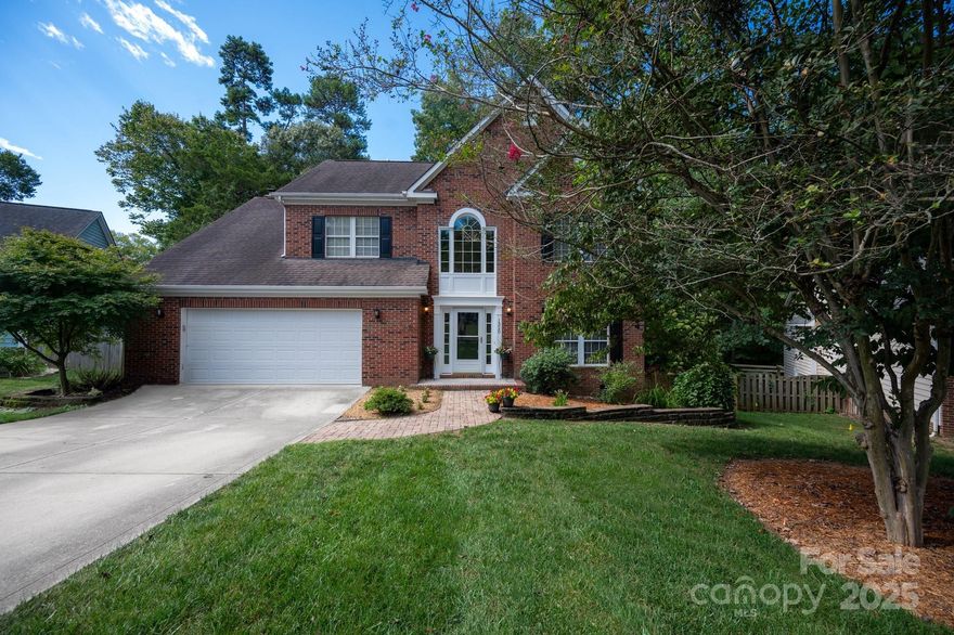 Nestled on a quiet cul-de-sac in a quaint and friendly neighborhood just minutes from shopping, dining, parks, and downtown Matthews, this 4-bedroom, 2.5-bath home is full of warmth, charm, and thoughtful updates. Lovely tile floors welcome you into a fully renovated kitchen with quartz countertops, custom cabinetry, stainless-steel appliances, an island with a black walnut butcher block section matching vent hood and coffee bar, and lighted pantry. The kitchen opens to an inviting family room with a beamed ceiling and cozy stone wood-burning fireplace.  Enjoy easy access from the family room (and a doggy door for the furry ones) to the large screened-in porch and deck overlooking the private, tranquil fenced backyard.  The main level also features a spacious formal dining room and a versatile living room/flex space with hardwood floors, laundry and powder rooms. Upstairs, the spacious primary suite boasts a tray ceiling and en-suite bath with frameless tiled shower, soaking tub, dual vanity, and custom walk-in California Closets system. Two additional generously sized bedrooms – one with custom California Closets, plus a huge bonus room ideal for play, home office, or 4th bedroom, and a full bath complete the upper level.  Additional highlights include a 2-car air-conditioned garage with workbench and electrical outlets – perfect for hobbies or a workshop, backyard shed for extra storage, and barbecue smoker for the grilling enthusiast.  Whether enjoying morning coffee on the screened-in porch, hosting summer cookouts, tending to a garden, or simply relaxing after a long day, the outdoor space provides the perfect backdrop for everyday living.