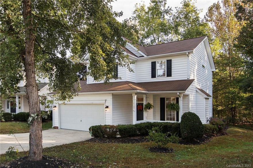 Perfect move in ready home! New paint thru out, new carpet, new SS kitchen appliances, new kitchen countertops. Fresh, clean and ready for a new owner. Inviting rocking chair front porch, open greatroom w/fireplace, nice dining area, kitchen & powder room down. Upstairs has large master w/ spacious master bath, garden tub & separate shower, large walk-in closet, & vaulted ceilings. Two additional bedrooms w/ secondary bathroom. Roof new in 2009. Home warranty existing w/HMS. All appliances stay!