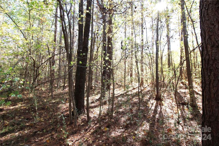 Beautiful 7+/- Acre tract of land on a quiet road in Clover SC. Property is surrounded by other large tracts and is conveniently located to York and Clover. Nice location to build your dream home. Minimum deed restrictions to create like in kind properties. Land has two separate tax parcels with the front portion being Clover School District and the back portion York School District. Land is part of a larger tract. CALL LISTING AGENT BEFORE SHOWING PROPERTY, IT IS CURRENTLY BEING HUNTED!!