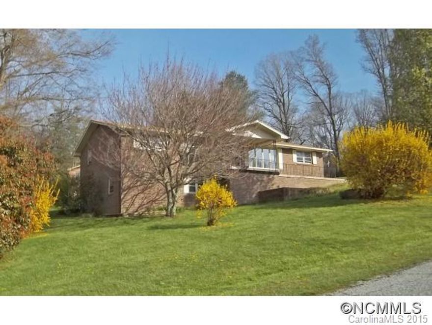 Great brick ranch with views of the surrounding mountains in 55+ neighborhood. Close to Fletcher's Park Ridge Hospital with great access to both Hendersonville and Asheville.  Shopping is just a few minutes away. Full unfinished framed basement with full bathroom facilities.  Lower level has daylight windows and outside door in nook. Sold "As Is".