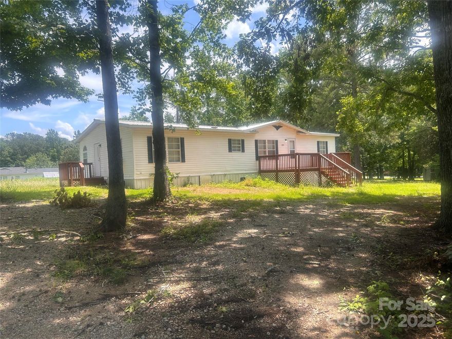 Beautiful single family home with 0.71 acre of land. Home is located in the historic town of Greenwood SC and is minutes away from Lake Greenwood. This beautiful home consist of an open floor plan with three bedroom and two full baths. Living room is very spacious with a dining room option and natural light throughout. Kitchen has an open floor plan as well with lots of storage space. Primary bedroom has lots of closet space with a large bathroom. If you are looking for a beautiful spacious single family home with lots of outdoor space for entertaining then look no further. This home has all that your looking for in a place you can call home.