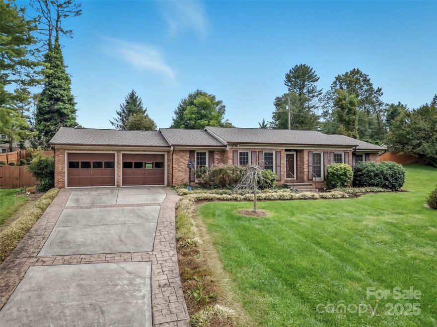 Located in Rugby Meadows, a well established neighborhood known for its private setting, convenient location, spacious lots, and quiet streets that provide an ideal environment for peaceful morning walks, and just 10 minutes from historic downtown Hendersonville and 10 minutes from Asheville airport, 304 Melissa Way is truly a home that is ready to go and awaits the new owner who will make lasting memories. Stepping inside you'll find hardwood floors, one level living, natural light, convenient floor plan, a spacious kitchen, appliances, and a large sunroom that's perfect for casual meals or entertaining. The living area flows seamlessly into a dining room, creating an inviting space for gatherings. The primary suite serves as a tranquil main-level retreat with a walk-in closet and en-suite bathroom. Two additional well-proportioned bedrooms share a full hall bath, offering ample space for guests, a home office, or a growing family.Outside, the magic of living in the Blue Ridge Mountains unfolds: a lush expansive fenced yard is gated and there's plenty of space for gardening. A two-car garage provides covered parking and storage, while the home's recent upgrades ensure peace of mind for years to come. At approximately 1,992 square feet, this turnkey gem is priced competitively and captures the essence of mountain living in one of Hendersonville's most desirable, whisper-quiet enclaves. Whether you're seeking a forever home or a weekend escape, this Rugby Meadows charmer awaits.