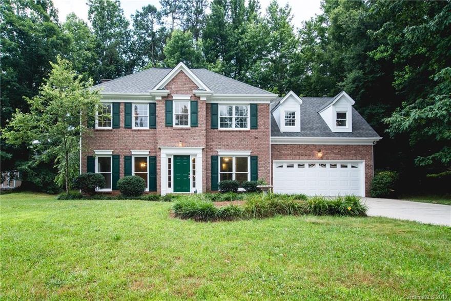 Must see this beautiful move in ready home in desirable Franklin Grove and Award Winning Mooresville Graded Schools.  Hardwoods throughout main level. Wonderful kitchen w/ granite countertops, SS appliances and breakfast bar opening up to large living room w/ wood burning fireplace.  Four large bedrooms up.  Beautiful screened in porch overlooking lush private back yard perfect for relaxing. Walking distance to Bellingham Park / Dye Creek Greenway. New carpet / New paint.  Roof Replaced in '12.