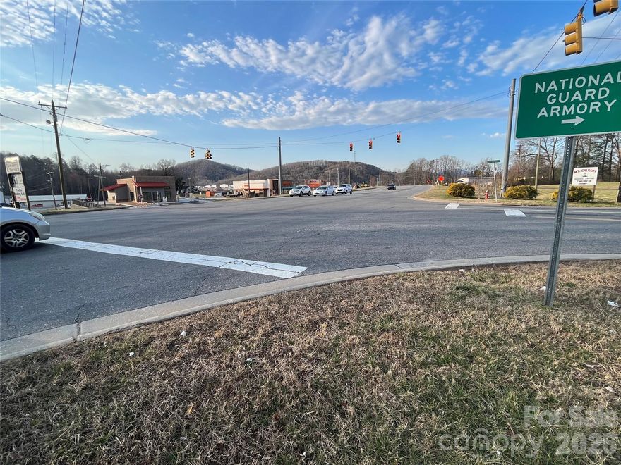 The Possibilities are endless with this one.....Great opportunity to take advantage of the Growth on the Sugar Hill Rd corridor. Corner Lot with access from both Sugar Hill Rd. and Veterans Dr. Very High traffic location close to Interstate 40.  New Popeyes and Backyard burgers going in across the street.  Possible availability of adjacent parcels. City Water and sewer available but they are currently using well and septic.  Call listing Agent for more information.