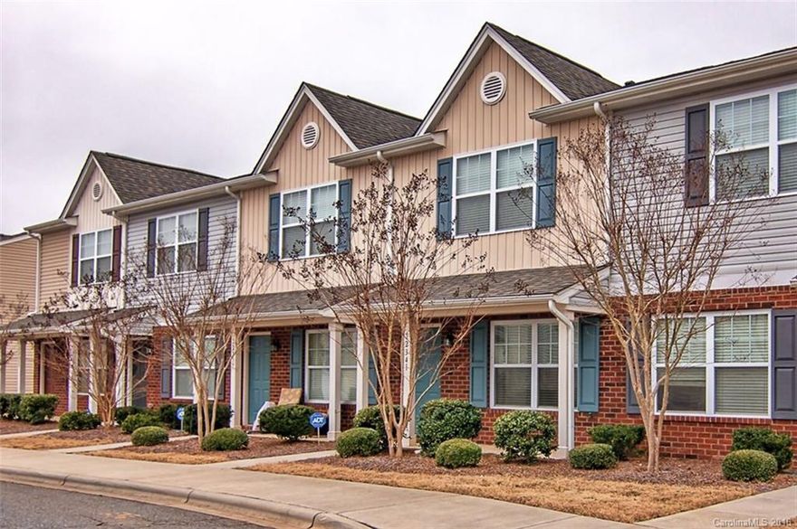 Ready to move into, cute as a button and with lots of upgrades, this open floor plan boasts beautiful new flooring. Kitchen has stainless steel appliance package, granite countertops and upgraded cabinetry. Large dining area. Two master bedrooms have spacious bathrooms that both have granite. Private fenced patio. Great community pool. Minutes to shopping. Convenient to I-85 and I-485.   **** Buyer's Loan Fell Through no fault of the seller or home"|**** Ready for quick close.  Pardon boxes!