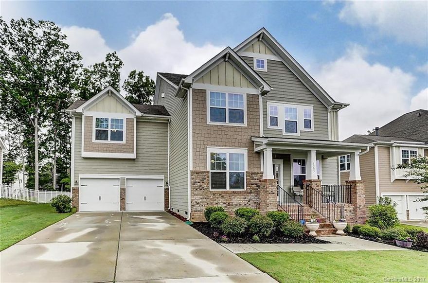 Resort Style Living in Lawson! 6 bed/5.5 bath home loaded w/extras on premium wooded lot. Spacious open floor plan is an entertainers dream. Guest suite on main w/priv bath & addt'l ½ bath on main, Enormous master retreat w/sitting area & FP for cozy nights! Jr. master(or)bonus. Crown molding added thruout. Stylish Gourmet kitchen w/SS appliances, dbl ovens, gas cooktop, & huge granite island w/bar seating! Stunning pre-finished Hardwoods, tile, luxury bath, office, cov front & screen rear porch