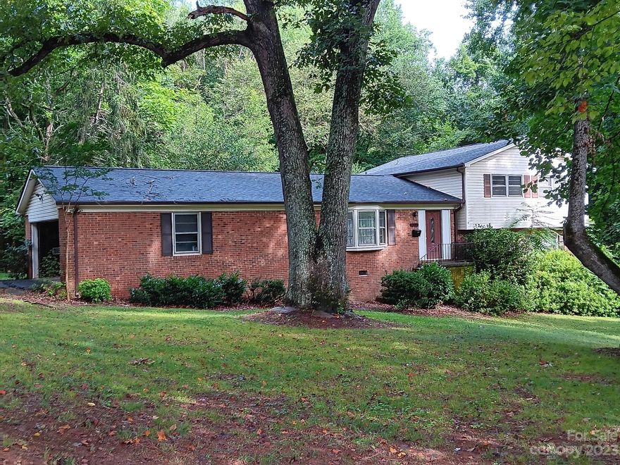 Located close to downtown China Grove.  Convenient to shopping, schools, restaurants & post office.  Large over 1/2 acre corner lot.  Brick and vinyl home being sold "as is".  Great opportunity, 3 bedrooms, 3 full baths, large rec room in lower level and large den with gas frpl. Den accesses lower deck.   Large Living room.  New roof in 2021.  Needs a little tlc - mainly cosmetic.  Multi level deck overlooks private backyard. Bay window in LR.