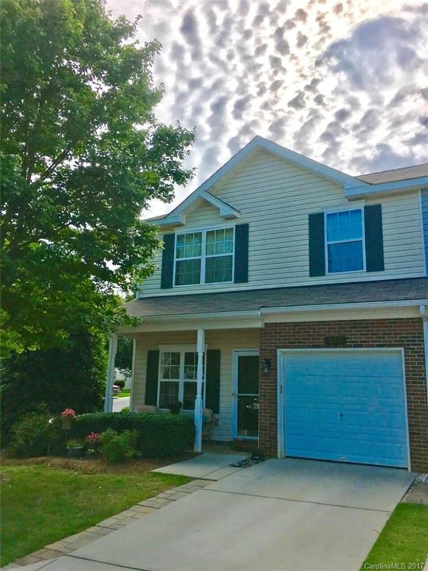 Absolutely beautiful End Unit Townhome! This was the builder's model so there are extra upgrades and features. Crown molding & wainscoting throughout the home. Large, open floor plan on main. Kitchen has tile backsplash and GE double oven range. Enclosed sitting area off the master bedroom that could be an office or a nursery. Master also has a large walk-in closet. Back patio has been enlarged to provide more room for entertaining. Townhome is conveniently located across from the pool.