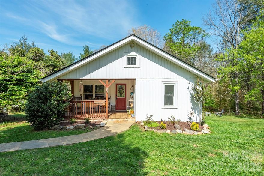 Adorable 2-bedroom cottage nestled on 1.5 acres in Buncombe County! This peaceful cottage in Alexander offers endless potential for gardening or creating your own mini farm. Recent upgrades include new appliances (range, washer/dryer, and water heater), keyless entry, and an inviting stone walkway. Plus, the crawlspace has been encapsulated, and crawlspace windows and door were replaced, for added peace of mind. Relax with your morning coffee or unwind in the evening on the covered front porch while enjoying the serene surroundings. Inside, the open floor plan seamlessly connects the kitchen, dining, and living areas—perfect for everyday living and entertaining. Need additional space? There are options to add a half or full bathroom, and room to expand outdoor living with a future back deck. A truly beautiful and tranquil setting ready for you to make it your own!