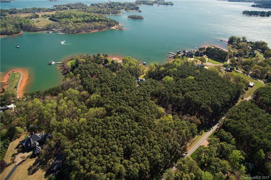 Imagine building your lakefront estate home on this prime 8 acres located on beautiful Lake Norman. With over 300' of waterfront and the park like setting with mature trees level topography make it a perfect place to call home. Convenient to Charlotte and surrounding areas. Land can be subdivided for builder opportunities.
