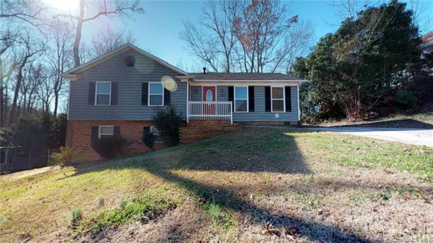 Amazing and fully renovated home close to it all! Seconds from the Whitewater Center, Robert L Smith Park, I-485, I-85, the airport, Riverbend shopping center and the future River District and minutes to Uptown. This home has all new floors, windows, new cabinets, new appliances (see flyer), fully painted and move-in ready.  The HUGE downstairs den with fireplace could be a man cave, workout area, guest suite and so much more!  There are two decks on the oversized yard, great for entertaining!